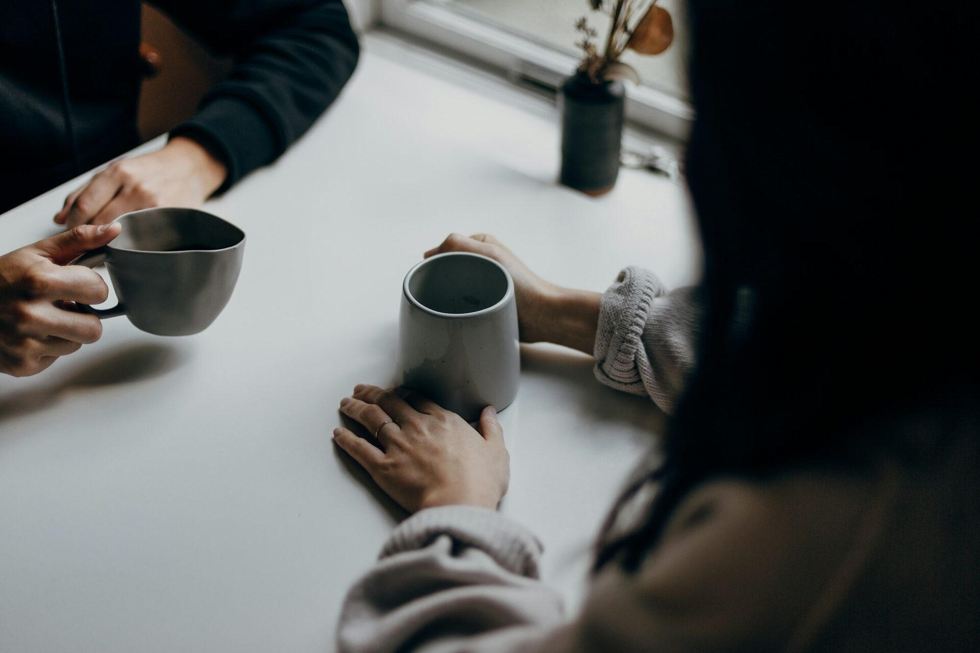 A deep one-on-one conversation over coffee